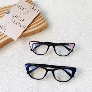 Retro cat-eye blue light blocking glasses for kids in black frame with stylish accents