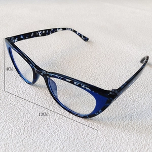 Close-up of blue marble cat-eye glasses frame with 4cm lens height and 13cm width details