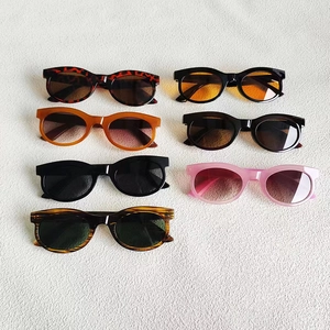 Collection of retro wide-frame rectangle sunglasses in diverse leopard and solid colors