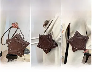 Detail view of brown star-shaped crossbody bag showing handbag, shoulder, and tote modes