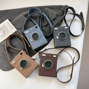 Retro camera-shaped crossbody bag in denim blue, gray, and brown color options