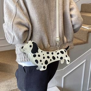 Creative dachshund-shaped crossbody bag with black spots and elegant slim shoulder strap