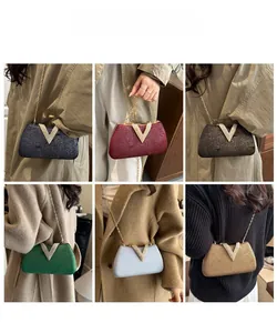 Detail shots of rhinestone evening clutches in six colors with metal chain straps
