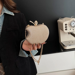 Champagne gold apple shaped evening clutch bag with glitter texture and chain strap