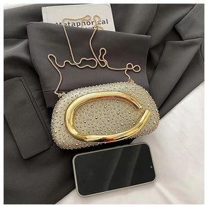 Luxuriöse Champagner-Gold-Abendtasche mit Strasssteinen und Handy zum Größenvergleich