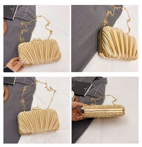 Detail views of champagne gold satin pleated evening clutch with metal chain strap