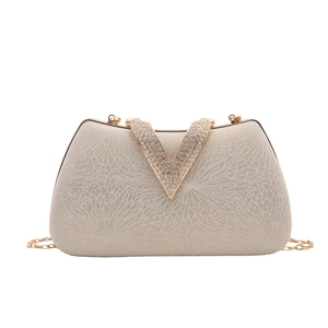 Elegant champagne gold rhinestone evening clutch bag with silk texture and chain strap