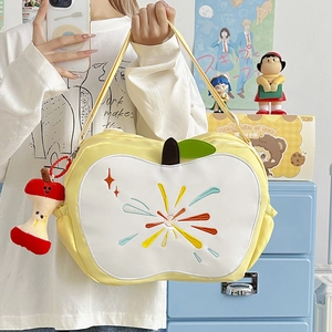 Cute yellow apple-shaped shoulder bag with colorful embroidery and plush apple core charm