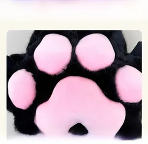 Detail view of the soft black plush and pink padded paw on the Japanese style backpack