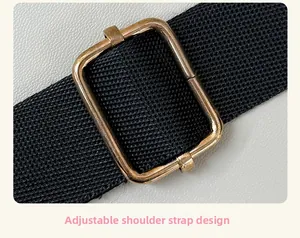 Detail of adjustable black woven shoulder strap with gold metal buckle on plush cat paw bag