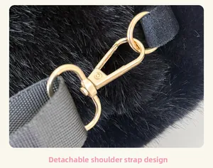 Detail of the detachable gold metal hook and high-density black strap on plush bag