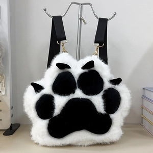 Detailed view of plush cat paw backpack featuring soft faux fur and black claw pads