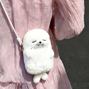Cute white plush seal crossbody bag with soft faux fur and cartoon facial details