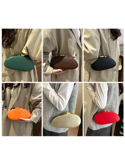 Detailed views of pebbled texture clutch bags in six colors with gold metal chains