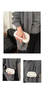 Detailed views of a white pebble-shaped clutch with gold chain and circular handle