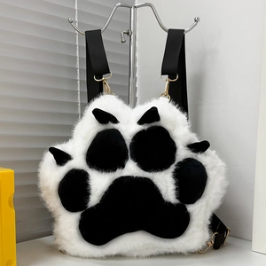 Cute plush 3D cat paw backpack in white and black faux fur with adjustable straps