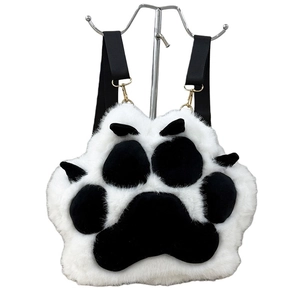 Cute 3D cat paw plush backpack with black and white faux fur and adjustable straps