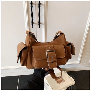 Detail of tan multi-pocket functional shoulder bag with metal buckle and matte finish