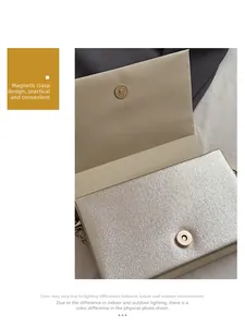 Macro view of champagne gold evening bag with magnetic closure and textured metallic finish