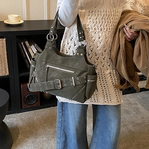 Olive green vintage motorcycle tote bag with rivet accents and stylish belt buckle details