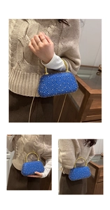 Royal blue acrylic evening bag with sparkling crystals and gold round handle detail