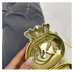 Detail of the high-quality magnetic closure and golden embossed interior of the fortune bag