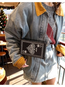 Detail of playing card box bag with rhinestone Ace of Spades and metal chain strap