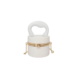 Retro cream white acrylic cylindrical handbag with thick curved handle and gold chain