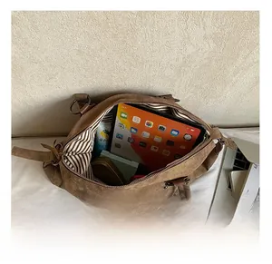 Top view of spacious interior with striped lining and large capacity storage details