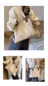 Detail of white tote bag with vintage metal rivets in wave pattern and brown handles