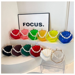 Detailed grid of jelly shell bags in twelve vibrant colors with faux pearl top handles