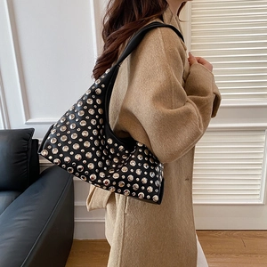 Retro black studded hobo bag for women with silver rivets and sleek matte finish