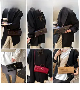 Detail view of stylish patent leather shoulder bags in black, red, brown and beige colors