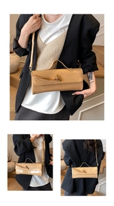 Detail of light khaki patent leather square bag with gold knot buckle and strap