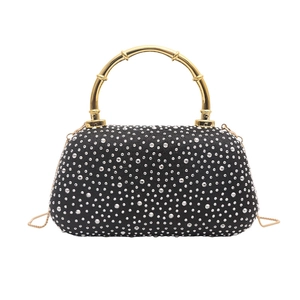 Elegant black evening clutch with silver rhinestones and golden bamboo metal handle