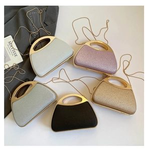 Glittering evening shell bags in five colors with round metal handles and chain straps