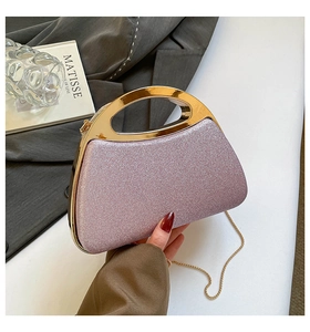 Pink sequin evening bag featuring a gold crescent handle and delicate metal chain