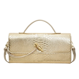 Luxurious gold snakeskin embossed evening clutch with top handle and metal lock