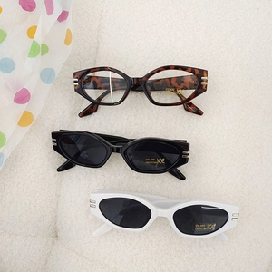 Kids vintage geometric cat-eye sunglasses with UV400 protection in brown, black, and white
