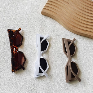 Fashionable geometric cat eye sunglasses in tortoiseshell, white and khaki resin frames