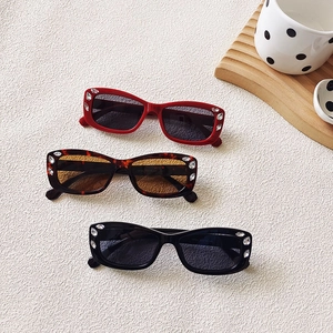 Retro rectangle sunglasses with rhinestone accents in red, tortoise, and black frames