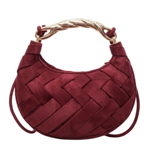 Fashionable woven burgundy suede crescent bag with a metallic gold spiral handle for women