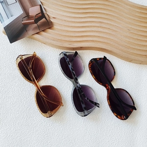 Chic oversized sunglasses set in amber brown and translucent grey resin frames