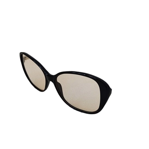 Fashionable oversized black frame sunglasses with light brown lenses for women in 45-degree view
