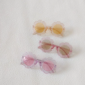 Kids flower sunglasses with glitter frames and colorful lenses for stylish girls