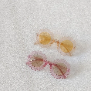 Pink and orange flower-shaped sunglasses for kids with glitter translucent frames