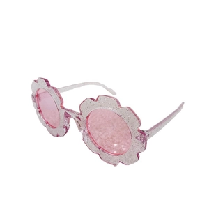 Stylish pink flower shaped sunglasses for kids with glitter frame and tinted lenses