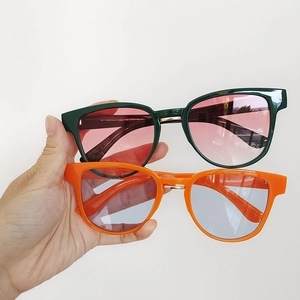 2025 Trendy champagne sunglasses with colorful frames and retro metal bridge design
