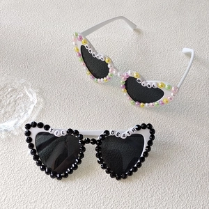 White heart sunglasses with Bride and Party Girl pearl bead lettering for bachelorette parties