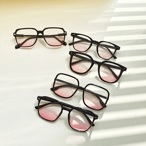 Collection of five black frame glasses with pink gradient lenses and modern shadow play